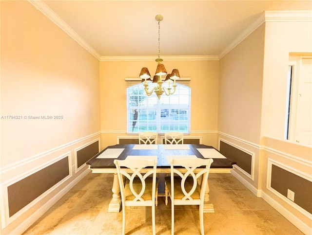 dining space with crown molding and an inviting chandelier