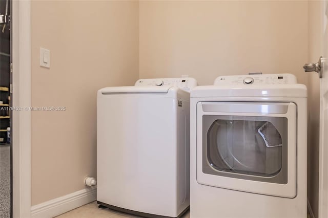 2041 SW Imperial St, Port St Lucie, FL 34987 - laundry room with independent washer and dryer