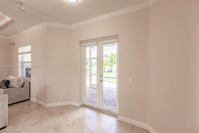 2041 SW Imperial St, Port St Lucie, FL 34987 - entryway featuring crown molding, plenty of natural light, baseboards, french doors, and light tile patterned floors