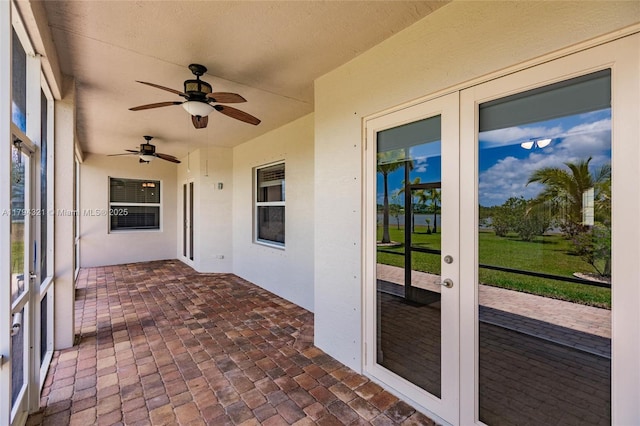 2041 SW Imperial St, Port St Lucie, FL 34987 - unfurnished sunroom with french doors and ceiling fan