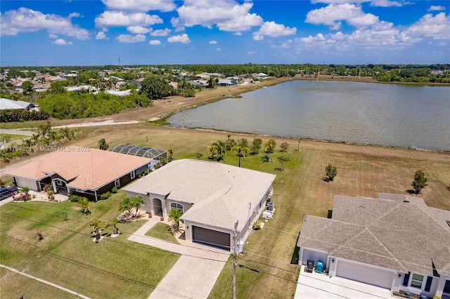 2041 SW Imperial St, Port St Lucie, FL 34987 - aerial perspective of suburban area with a large body of water