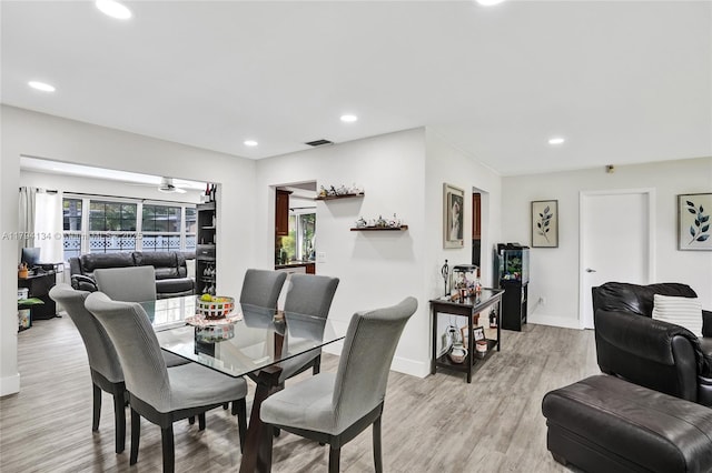 11240 Sheridan St, Pembroke Pines, FL 33026 - dining space with recessed lighting, baseboards, and light wood-type flooring