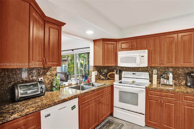 11240 Sheridan St, Pembroke Pines, FL 33026 - kitchen with a sink, a toaster, white appliances, and tasteful backsplash