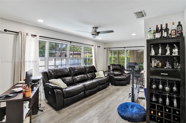 11240 Sheridan St, Pembroke Pines, FL 33026 - living area featuring visible vents, a ceiling fan, wood finished floors, and recessed lighting