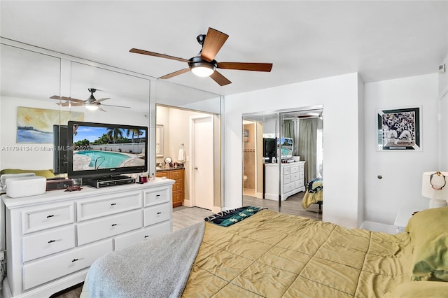 11240 Sheridan St, Pembroke Pines, FL 33026 - bedroom featuring baseboards, ceiling fan, light wood-type flooring, and connected bathroom