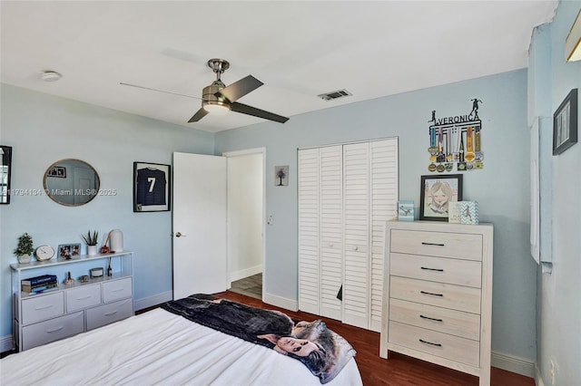11240 Sheridan St, Pembroke Pines, FL 33026 - bedroom featuring visible vents, dark wood-style flooring, baseboards, and a closet