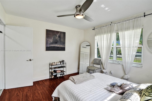 11240 Sheridan St, Pembroke Pines, FL 33026 - bedroom featuring baseboards, a ceiling fan, and wood finished floors