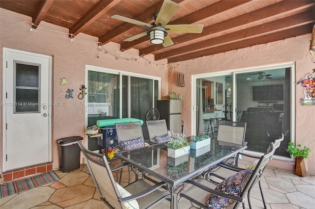 view of patio / terrace featuring ceiling fan and outdoor dining area