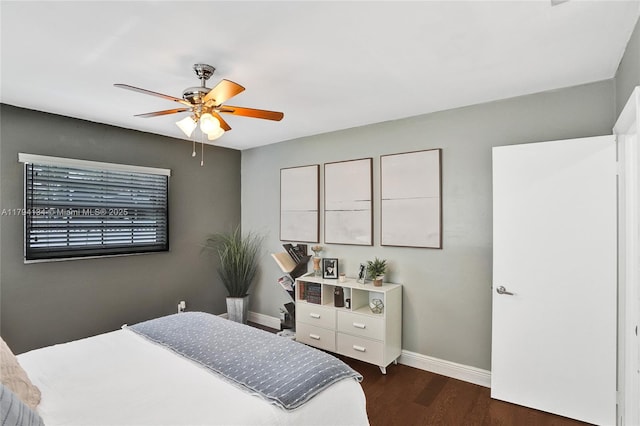 11240 Sheridan St, Pembroke Pines, FL 33026 - bedroom featuring baseboards, a ceiling fan, and dark wood-style flooring