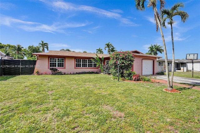 ranch-style house with a garage, stucco siding, concrete driveway, and a front yard