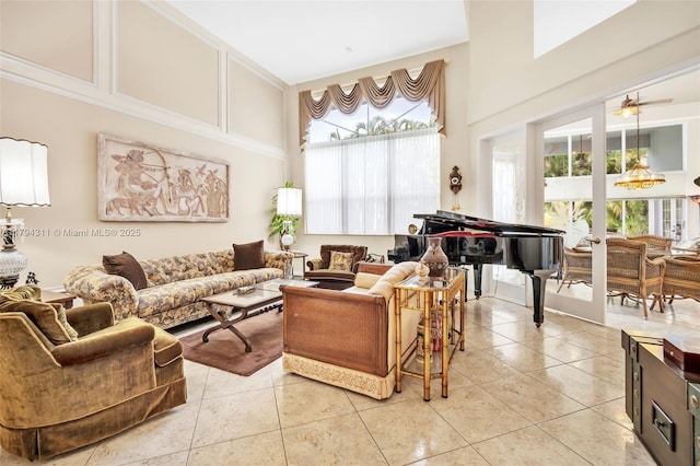 4123 W Lake Estates Dr, Davie, FL 33328 - living area featuring a towering ceiling, light tile patterned floors, and a ceiling fan