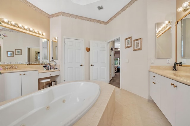4123 W Lake Estates Dr, Davie, FL 33328 - full bath with a tub with jets, tile patterned floors, ensuite bath, and two vanities
