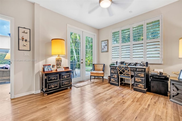 4123 W Lake Estates Dr, Davie, FL 33328 - living area with ceiling fan, wood finished floors, french doors, and plenty of natural light