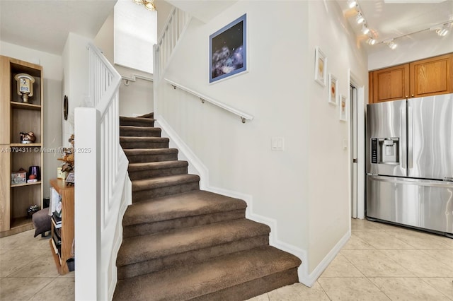 4123 W Lake Estates Dr, Davie, FL 33328 - stairway with tile patterned floors, baseboards, and rail lighting
