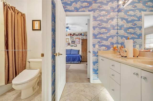 4123 W Lake Estates Dr, Davie, FL 33328 - ensuite bathroom with wallpapered walls, tile patterned floors, double vanity, and a ceiling fan