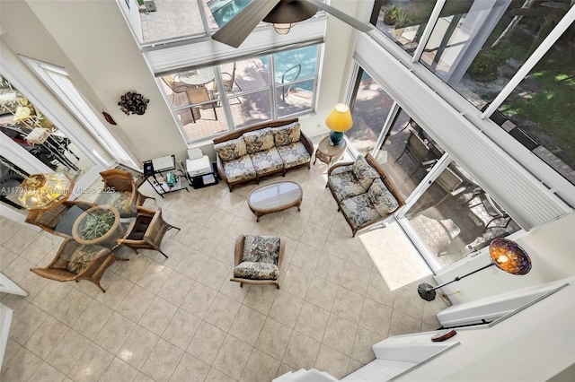 4123 W Lake Estates Dr, Davie, FL 33328 - living area with tile patterned floors and a towering ceiling