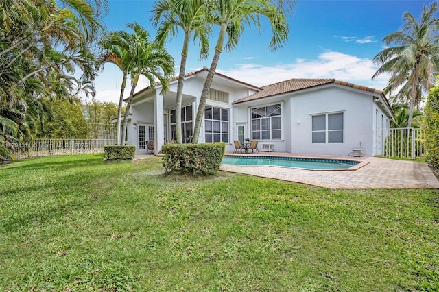 4123 W Lake Estates Dr, Davie, FL 33328 - back of house featuring french doors, stucco siding, a patio, and a tiled roof