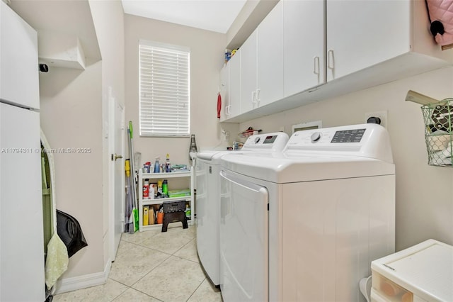 4123 W Lake Estates Dr, Davie, FL 33328 - washroom with cabinet space, washing machine and clothes dryer, and light tile patterned flooring