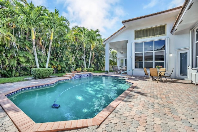 4123 W Lake Estates Dr, Davie, FL 33328 - outdoor pool featuring a patio area, outdoor dining area, and a ceiling fan