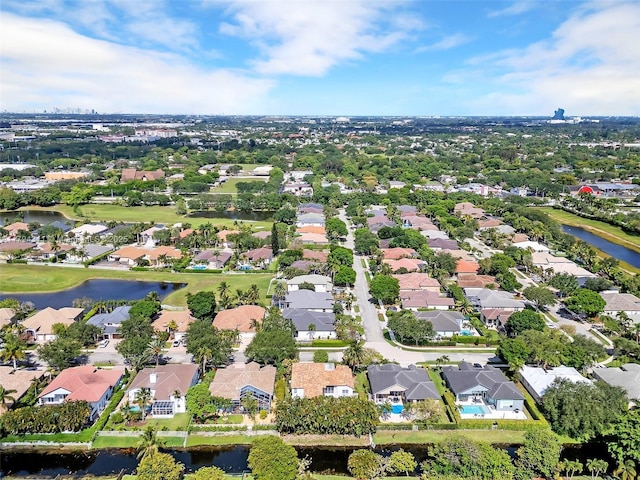 4123 W Lake Estates Dr, Davie, FL 33328 - aerial view of property and surrounding area with a large body of water and nearby suburban area