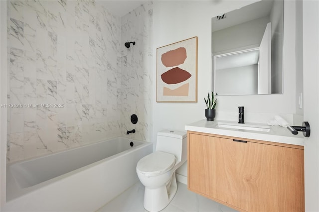 bathroom with vanity, tub / shower combination, and toilet