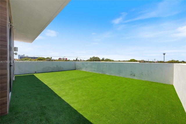 view of yard with fence