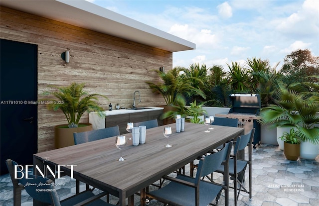 view of patio with outdoor dining area and a sink