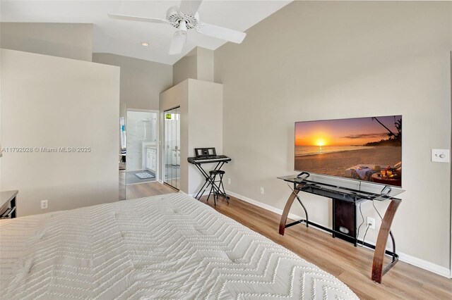 7649 Briar Cliff Cir, Lake Worth, FL 33467 - bedroom featuring wood finished floors, baseboards, and high vaulted ceiling