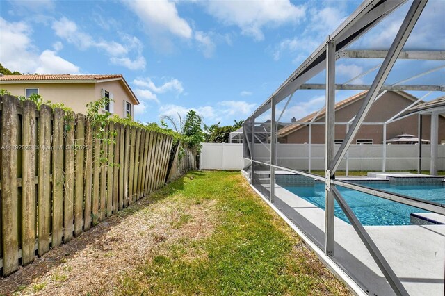 7649 Briar Cliff Cir, Lake Worth, FL 33467 - view of pool featuring glass enclosure