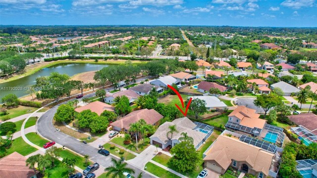 7649 Briar Cliff Cir, Lake Worth, FL 33467 - aerial view of residential area featuring a nearby body of water