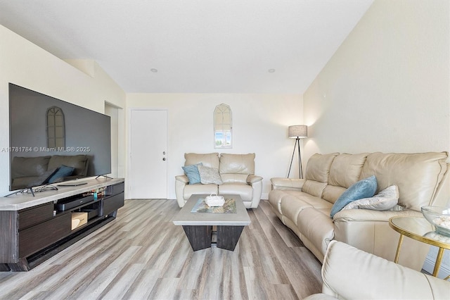 6340 NW 198th Ter, Hialeah, FL 33015 - living room with light wood-style flooring