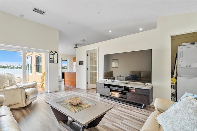 6340 NW 198th Ter, Hialeah, FL 33015 - living room with visible vents, baseboards, french doors, a ceiling fan, and light wood finished floors