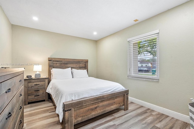 6340 NW 198th Ter, Hialeah, FL 33015 - bedroom with baseboards, recessed lighting, and light wood finished floors