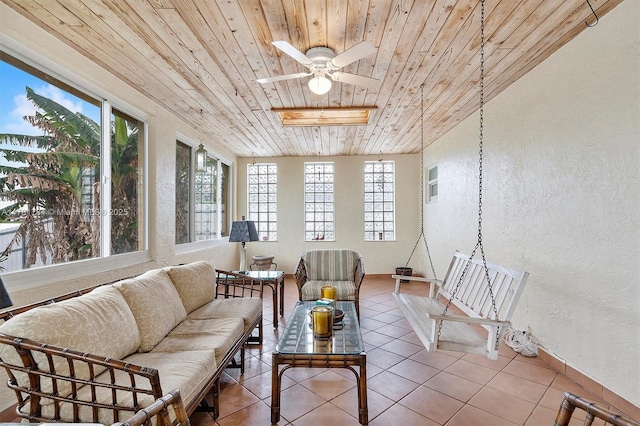 6340 NW 198th Ter, Hialeah, FL 33015 - sunroom / solarium featuring wooden ceiling, a textured wall, baseboards, and tile patterned flooring