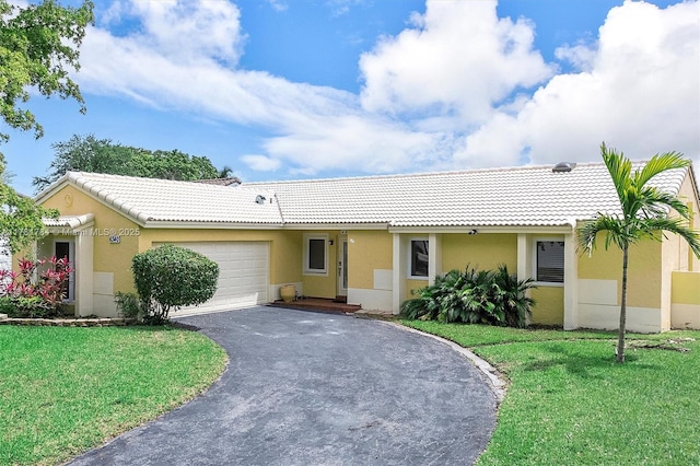 6340 NW 198th Ter, Hialeah, FL 33015 - ranch-style house with a front lawn, aphalt driveway, a garage, stucco siding, and a tiled roof