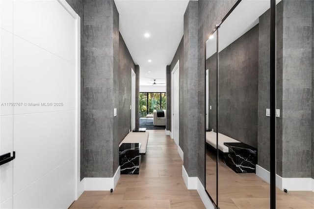 hall featuring recessed lighting and wood finished floors
