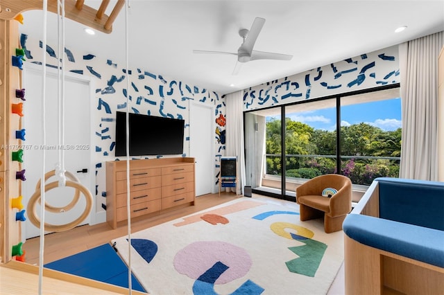 interior space featuring recessed lighting, wallpapered walls, access to exterior, and ceiling fan