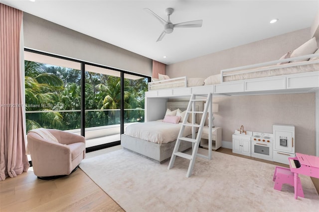 bedroom with recessed lighting, ceiling fan, and wood finished floors