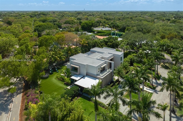 aerial view featuring a view of trees