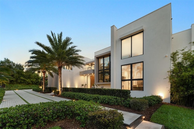 view of front of house featuring stucco siding
