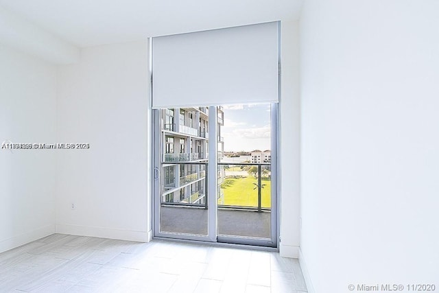2000 Metropica Way Unit 615, Sunrise, FL 33323 - empty room with baseboards