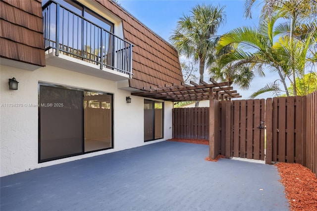 853 SW 118th Ter, Davie, FL 33325 - view of patio / terrace featuring fence, a pergola, and a balcony