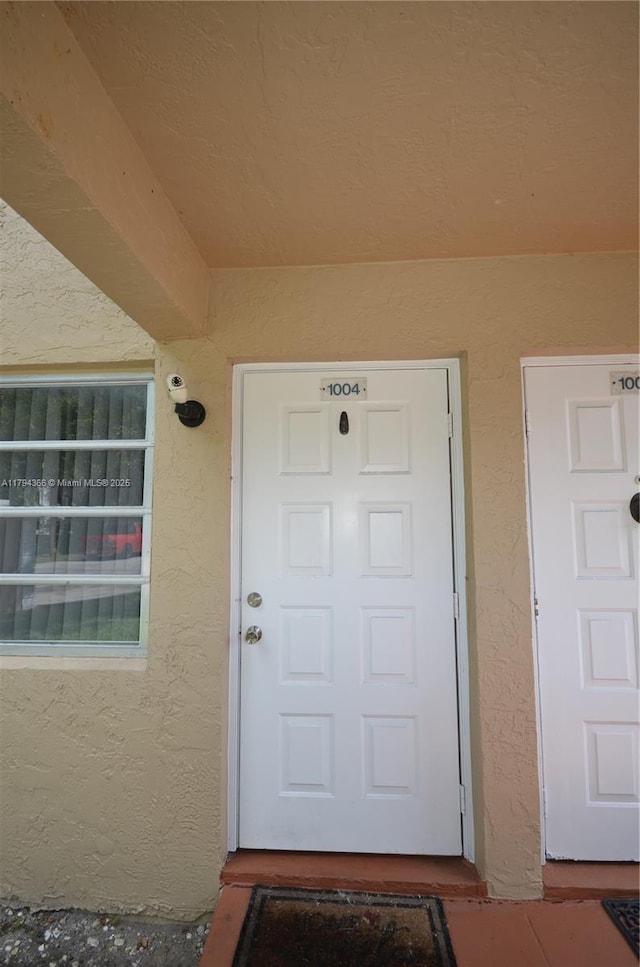 1004 Twin Lakes Dr Unit 1004, Coral Springs, FL 33071 - entrance to property with stucco siding