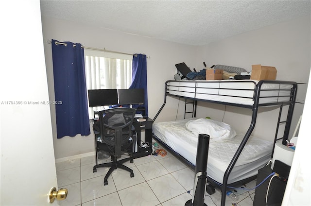 1004 Twin Lakes Dr Unit 1004, Coral Springs, FL 33071 - bedroom with baseboards and a textured ceiling