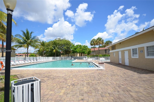 1004 Twin Lakes Dr Unit 1004, Coral Springs, FL 33071 - pool featuring fence and a patio area