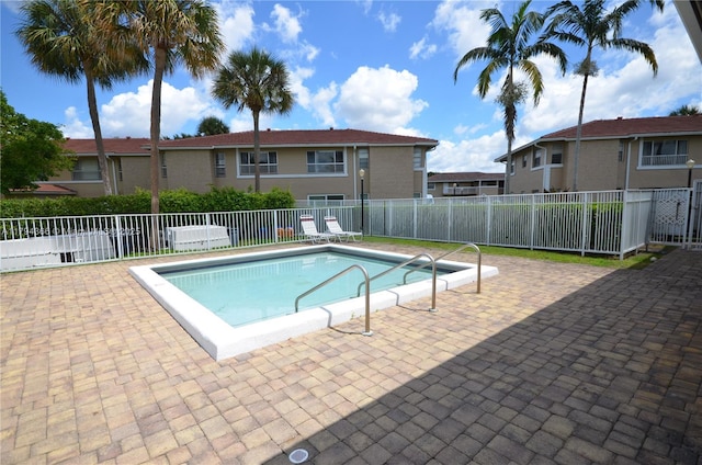 1004 Twin Lakes Dr Unit 1004, Coral Springs, FL 33071 - community pool with fence and a patio area