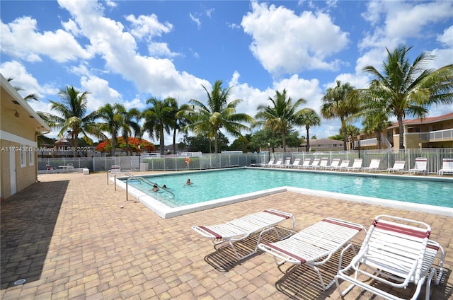 1004 Twin Lakes Dr Unit 1004, Coral Springs, FL 33071 - community pool featuring a patio area and fence