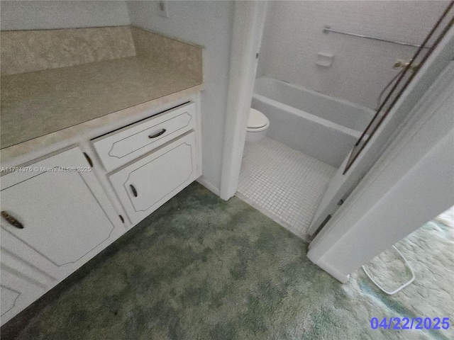 full bath featuring carpet flooring, toilet, tile patterned floors, a tub to relax in, and a shower
