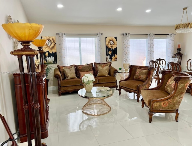 tiled living room featuring recessed lighting and a wealth of natural light