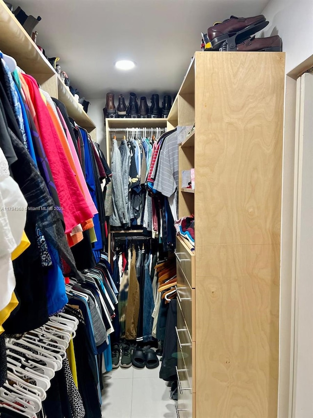 walk in closet featuring tile patterned floors